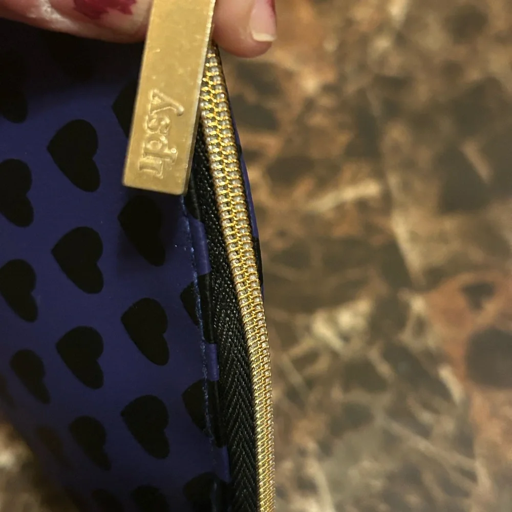 Ipsy indigo make up bag with black heart print